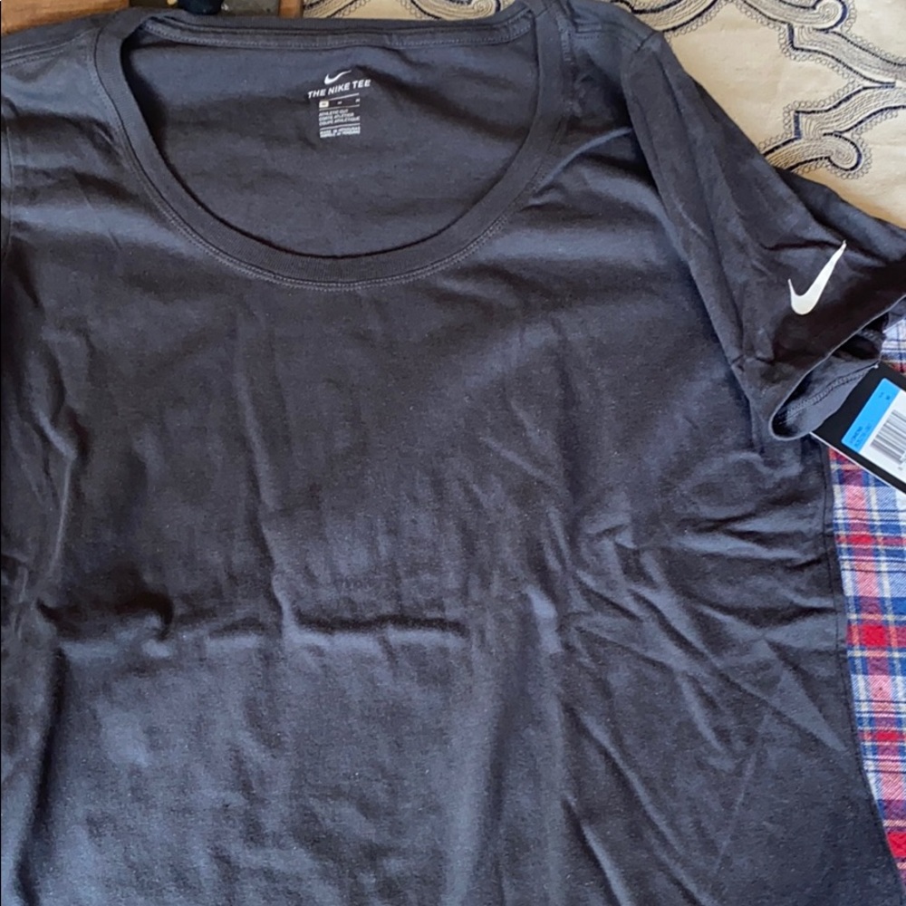100% cotton Nike tee.